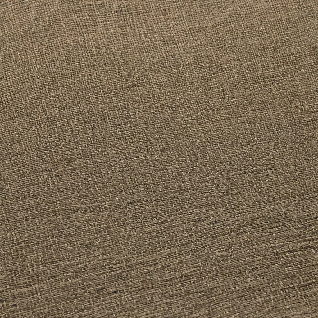 Close-up of beige linen fabric showing woven texture and natural fibers.